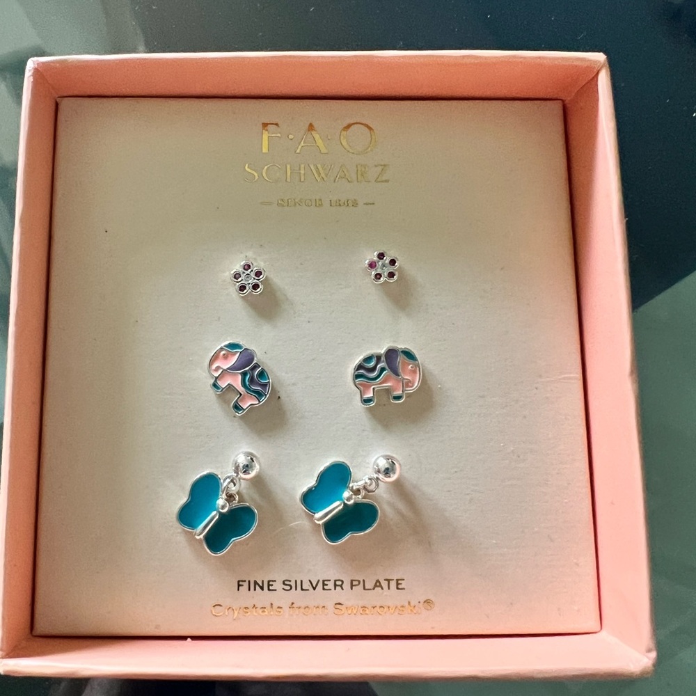 FAO Schwarz kids Silver and Blue Jewelry Set
Earring trio